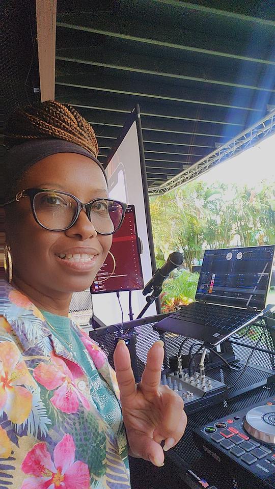 DJ Maina B at her DJ booth